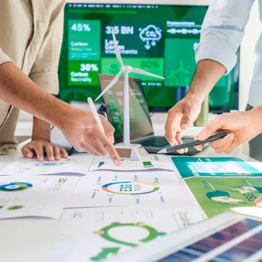 diversity team discussion focused on ESG (environment,social,governance)  for net zero goals in a sustainable green office